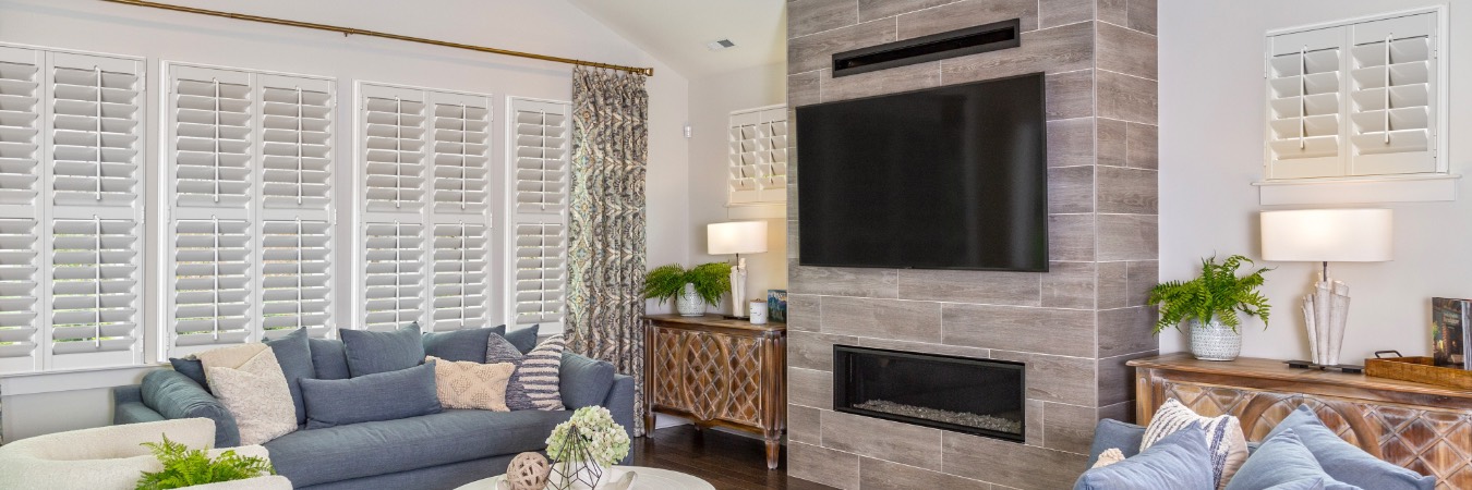 Plantation shutters in New Braunfels living room with fireplace