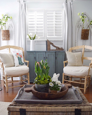 Plantation shutters in breezy room.