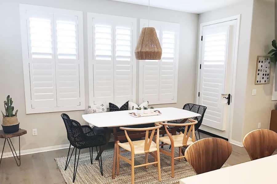 Use Polywood shutters to control natural light levels in your San Antonio dining room. Polywood shutters with top louvers tilted open in a dining room