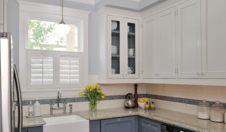 It's easy to clean kitchen messes off of your Polywood® plantation shutters.  Polywood shutters in a San Antonio kitchen.